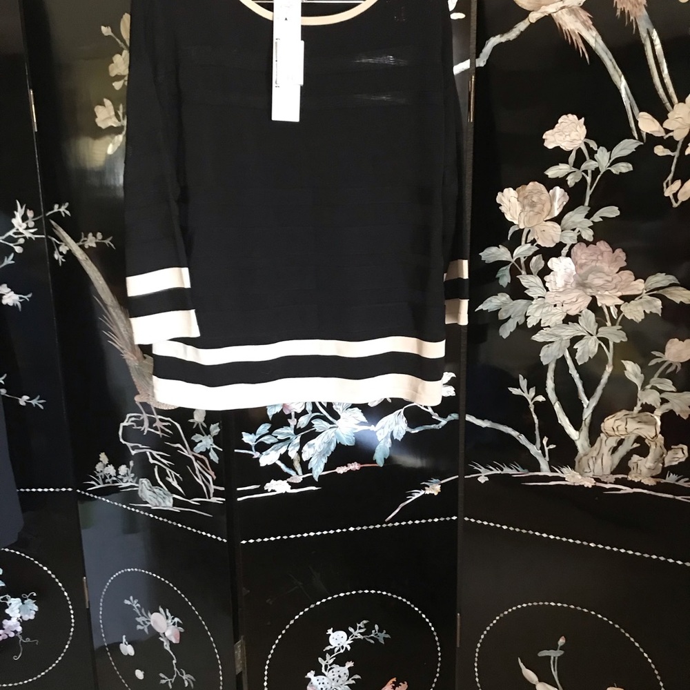 NWT black with tannish color on the sleeves and collar reduction sale 2026.